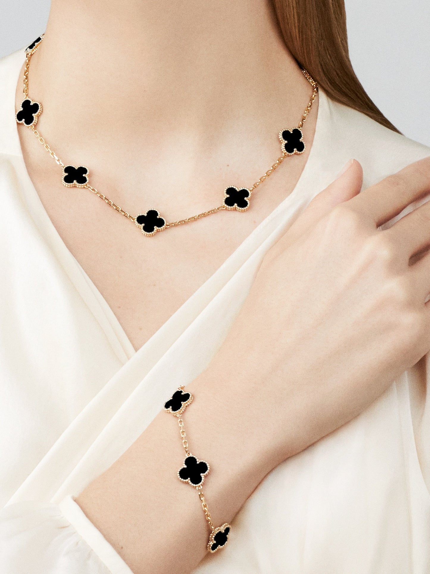 CLOVER NECKLACE 10 DESIGNS GOLD | ZWART